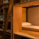 Image for article titled In Tokyo’s library-hotel, guests sleep in the bookshelves